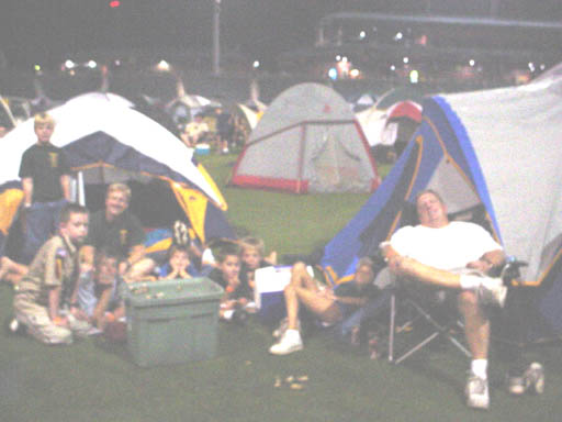 Pack 318 settles in for a movie on the jumbotron