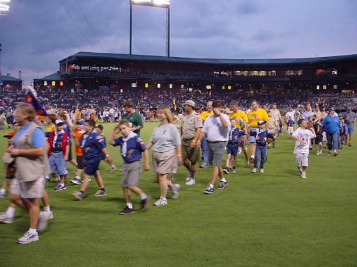 Scouts from throughout the First Coast parade on the field